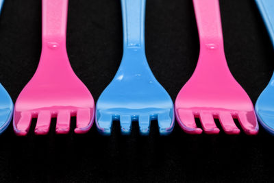 Close-up of multi colored lights against black background