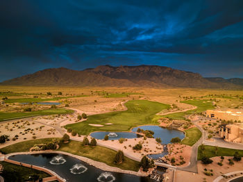 Countryside landscape against blue sky