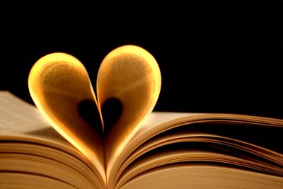 Close-up of heart shape on book