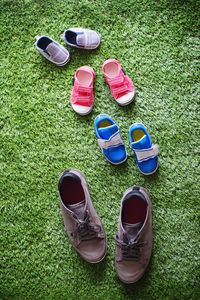 High angle view of shoes on grass
