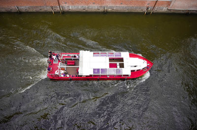 High angle view of red boat moored on river