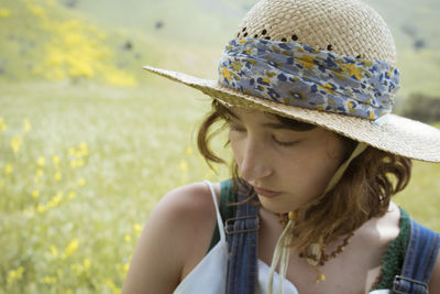 Portrait of woman wearing hat