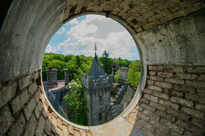 Built structure against cloudy sky