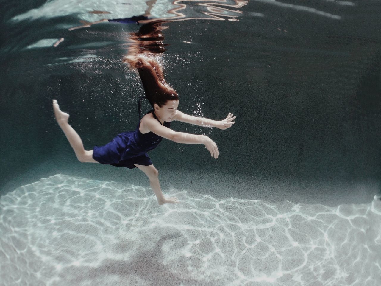 water, lifestyles, leisure activity, full length, waterfront, enjoyment, swimming, childhood, motion, fun, vacations, sea, jumping, boys, shirtless, high angle view, side view, carefree