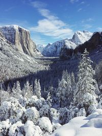 Scenic view of mountains against sky during winter