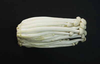 Close-up of bread against black background