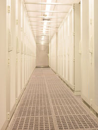 Cold aisle and front view of server racks in a data center