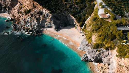 Aerial view of beach by rock formation