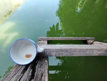 High angle view of coffee cup on table