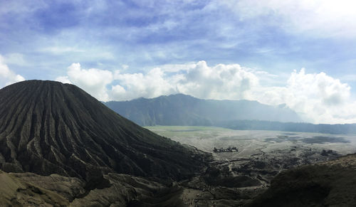 Panoramic view of volcanic landscape against sky