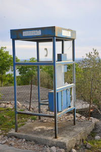 Built structure on field against sky