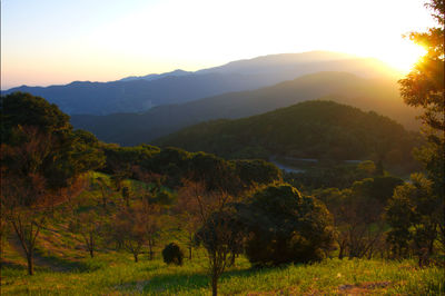 Scenic view of mountains at sunset