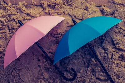 High angle view of paper on beach