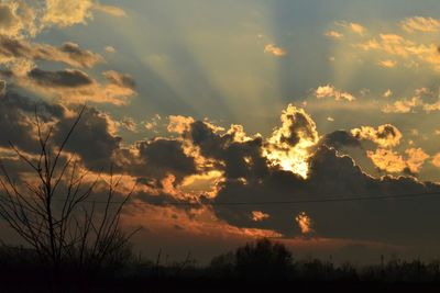 Scenic view of cloudy sky at sunset