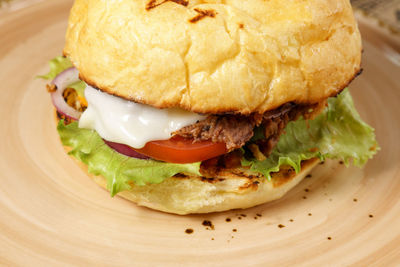 Close-up of burger in plate