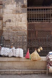 Clothes hanging on wall of building