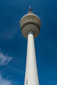 Low angle view of lighthouse against clear blue sky