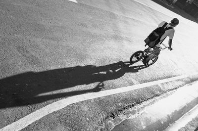 High angle view of man riding motorcycle