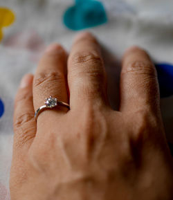 Close-up of human hand with ring