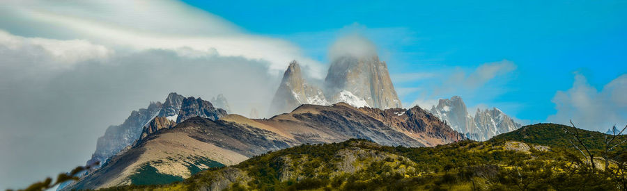 Panoramic view of mountain range against sky