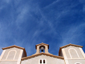 Low angle view of cathedral against blue sky