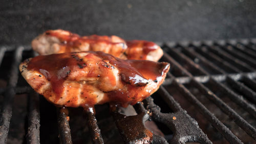 Close-up of meat on barbecue grill