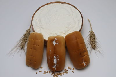 High angle view of food on table against white background