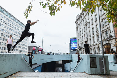 Man jumping in city