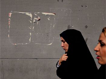 Close-up of woman standing in pond