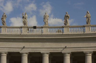 Low angle view of statue against cloudy sky