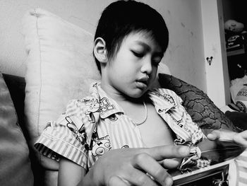 Child using tablet at home
