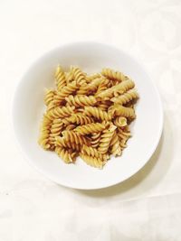 Close-up of pasta in plate on table