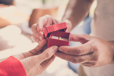 Close-up of people holding hands
