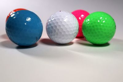 Close-up of multi colored balls on table