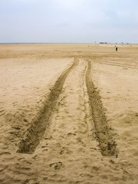 Tire tracks on beach