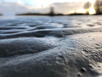 Surface level of sea against sky