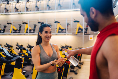 Portrait of couple love in fitness training with dumbbell young couple caucasian are working out