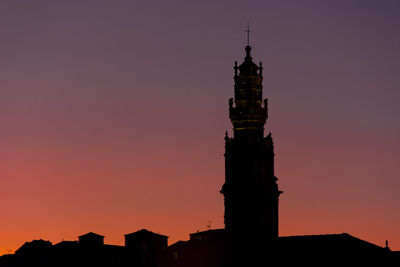 Silhouette of statue at sunset