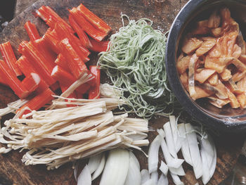 High angle view of chopped vegetables in bowl on table