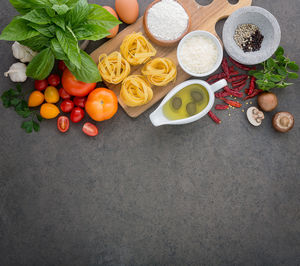 High angle view of fruits and vegetables on cutting board