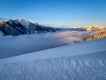 Snowcapped mountains against sky