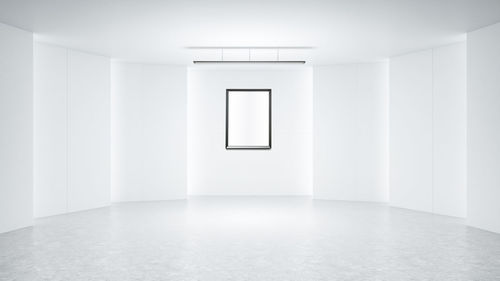 Blank frames on wall in modern room