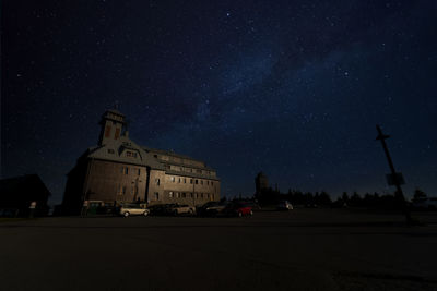 View of illuminated building against sky at night