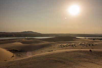 Scenic view of desert against sky