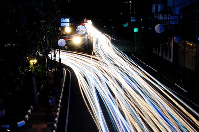 Light trails on road at night