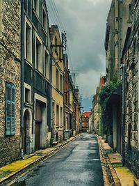 Road leading towards buildings