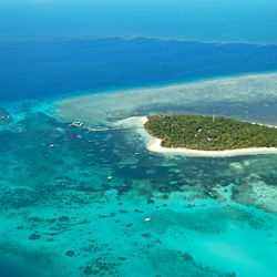 High angle view of island amidst sea