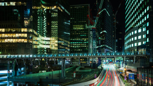 Aerial view of city lit up at night