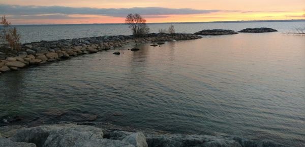 Scenic view of sea against sky during sunset