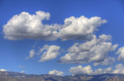 Clouds over mountain range